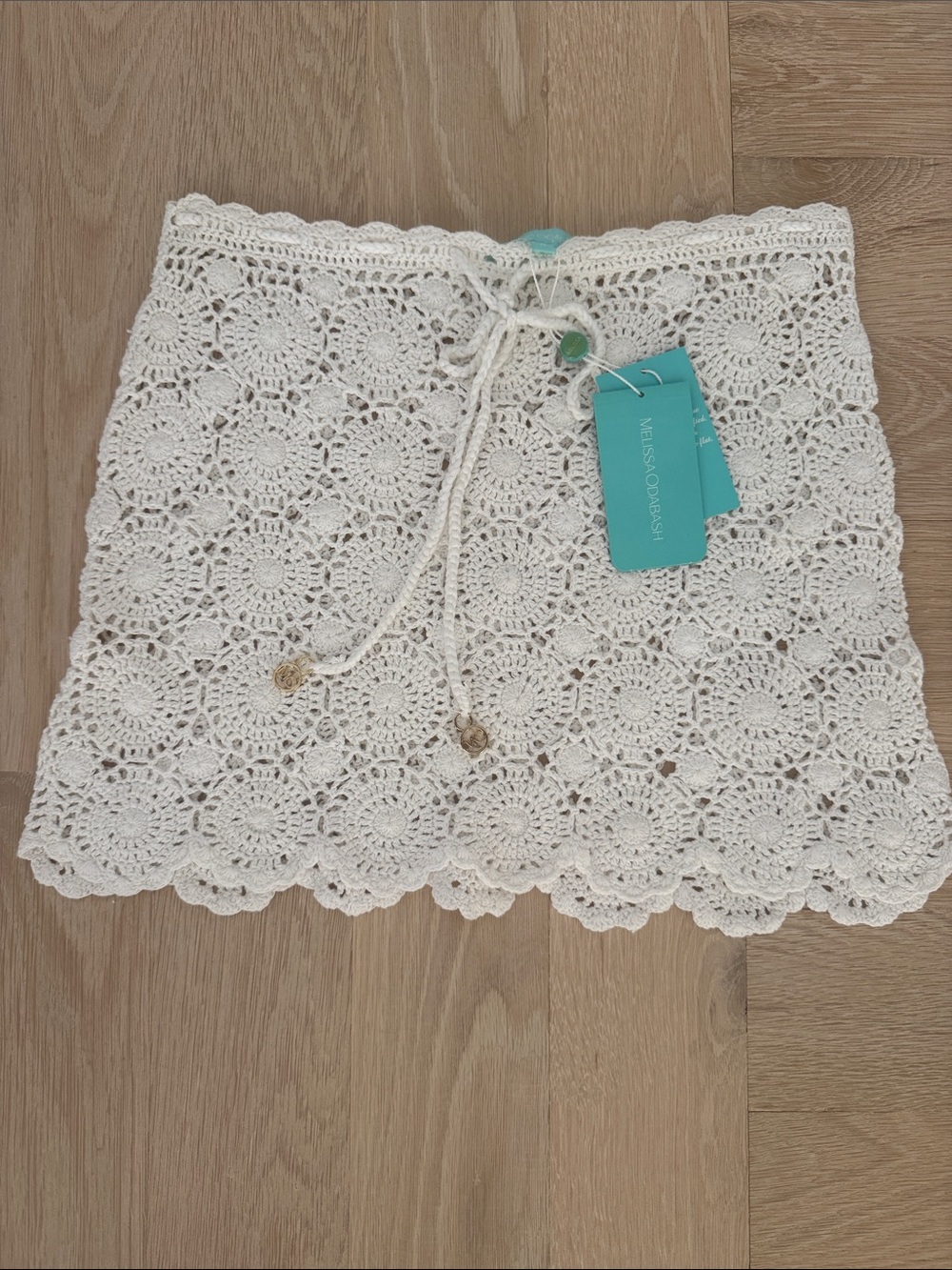 Never worn with tags Melissa Odabash white Crochet Mini Skirt with Drawstring